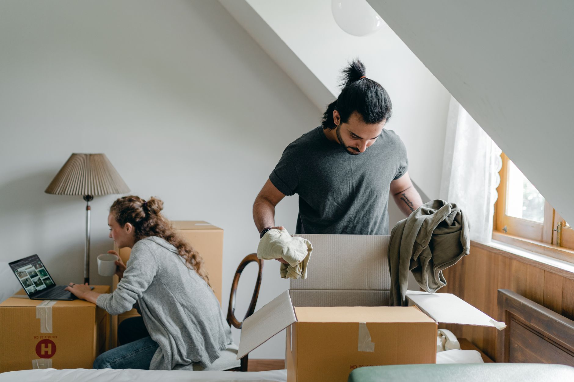 Students preparing boxes in their accommodation